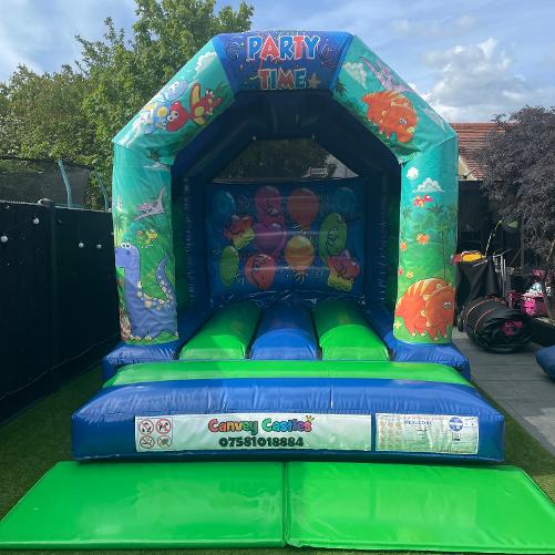 10 x 12 ft Small Green and Blue Dinosaur Bouncy Castle Hire Essex