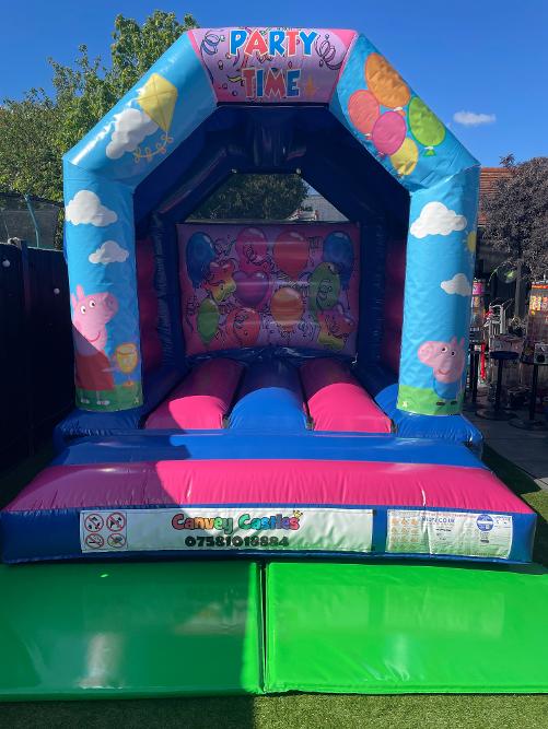 10 x 12 ft Small Pink and Blue Peppa Pig Bouncy Castle Hire Essex