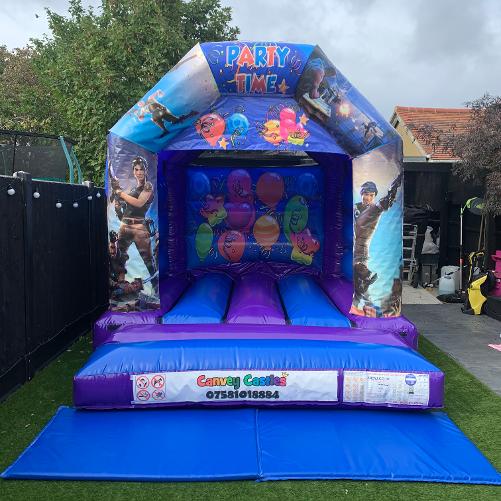10 x 12 ft Small Blue and Purple Fortnite Bouncy Castle Hire Essex