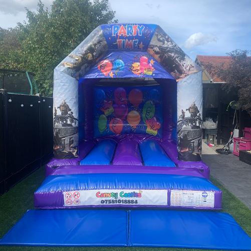 10 x 12 ft Small Blue and Purple Call of Duty Warzone Bouncy Castle Hire Essex