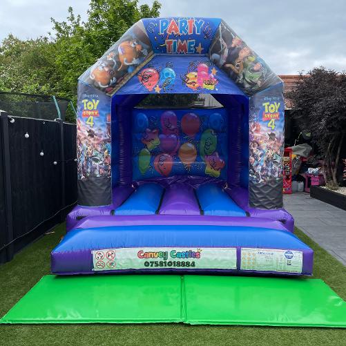 10 x 12 ft Small Blue and Purple Toy Story 4 Bouncy Castle Hire Essex