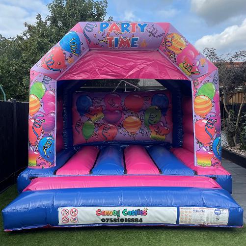 12 x 12ft Medium Pink and Blue Partytime Bouncy Castle Hire In Essex