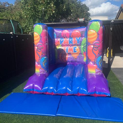 7ft x 8ft Blue and Purple Partytime Bouncy Castle Hire In Essex