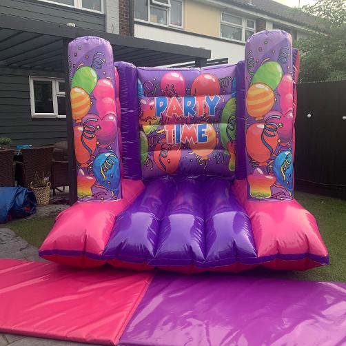 7ft x 8ft Blue and Purple Partytime Bouncy Castle Hire In Essex