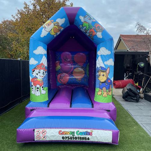 8 x 12ft Extra Small Blue and Purple Paw Patrol Themed Inflatable Hire Essex
